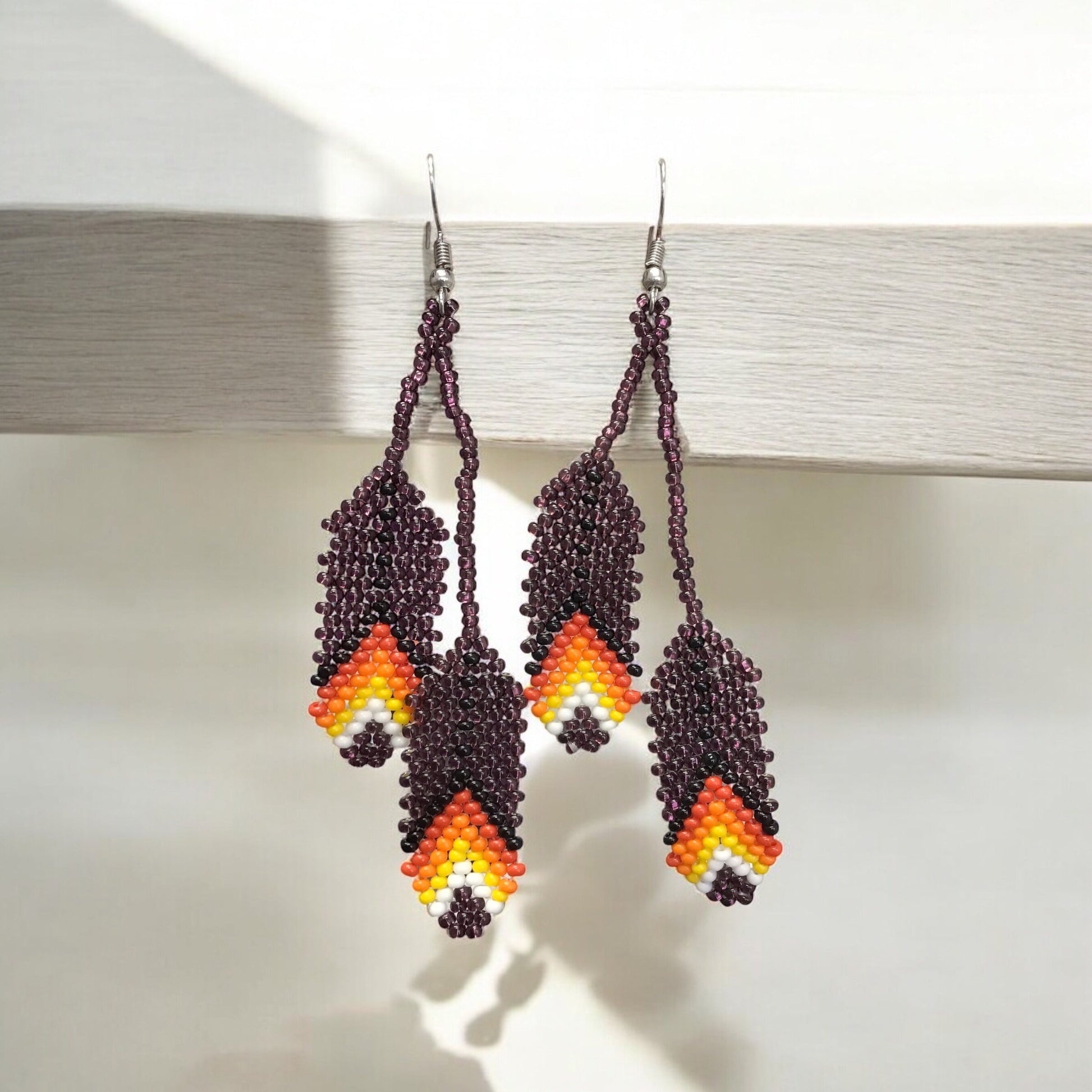 OldTribes™ blackberry beaded Feather earrings